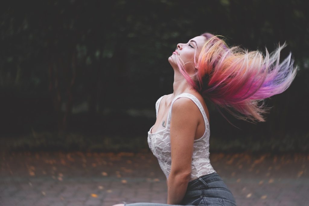 woman hair portrait flip hair flip color